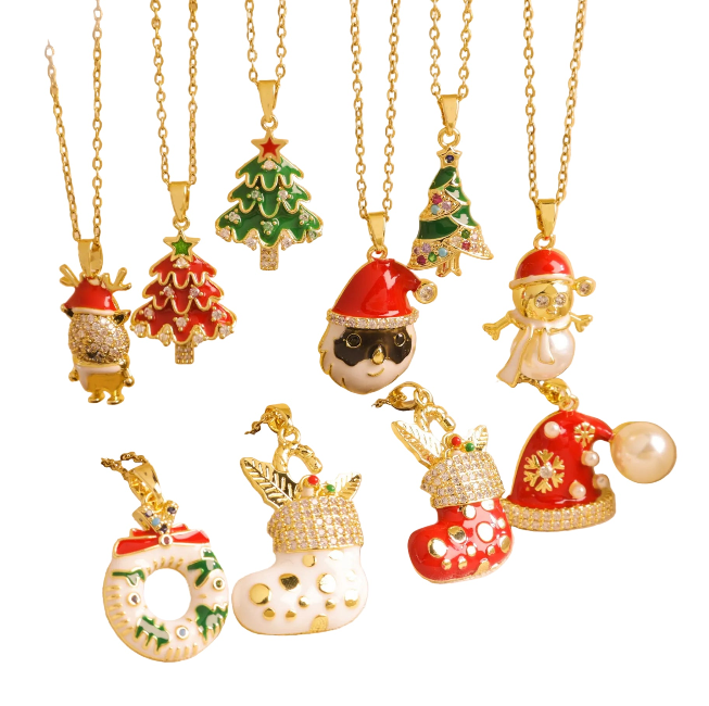 Christmas enamel pendant necklace collection — Santa, Christmas tree, reindeer, stocking and more festive charm styles on gold chains